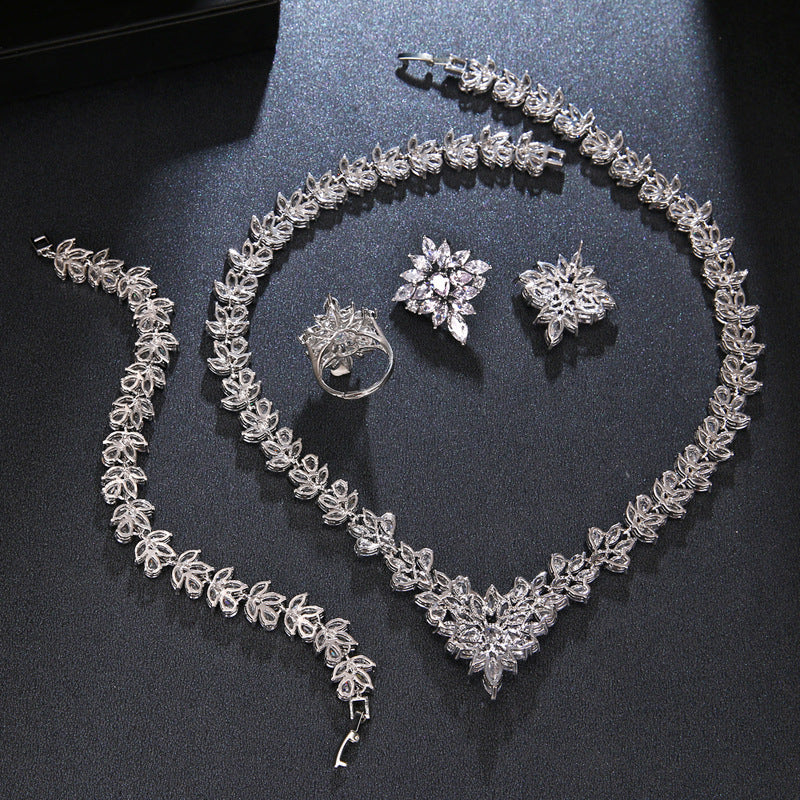 The Dazzling Set Is Handcrafted With Copper And Set With Zircon Stones.