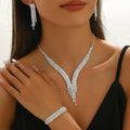 TiktokCross-border Water Drops Tassel Necklace Earrings Bracelet Three-piece Set Light Luxury Elegant Clavicle Chain Necklace For Women