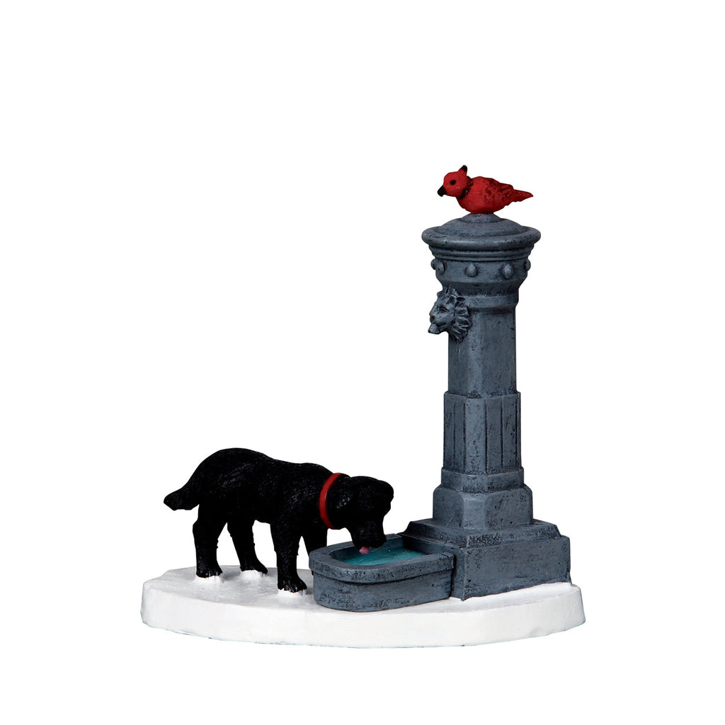 Water Fountain with a Puppy Taking a Drink
